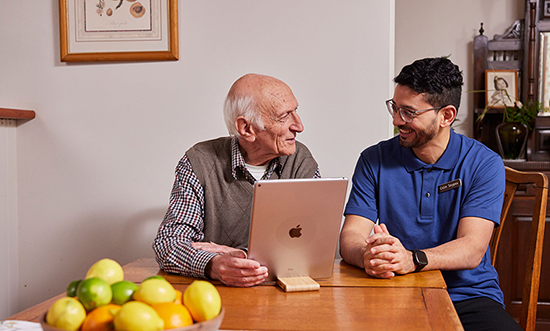 Elderly man using an iPad