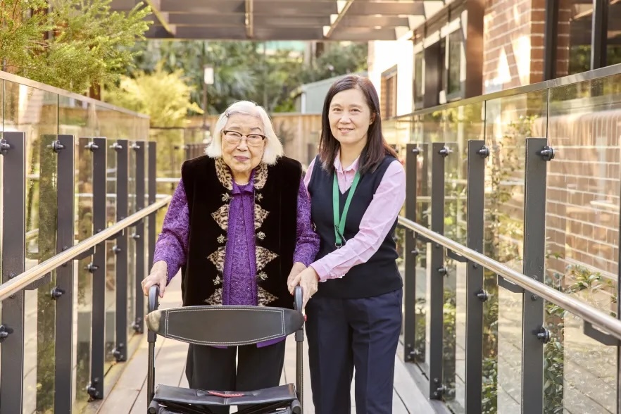 Image of an aged care resident with a carer